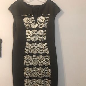 Dressy dress with front lace design. Never worn.